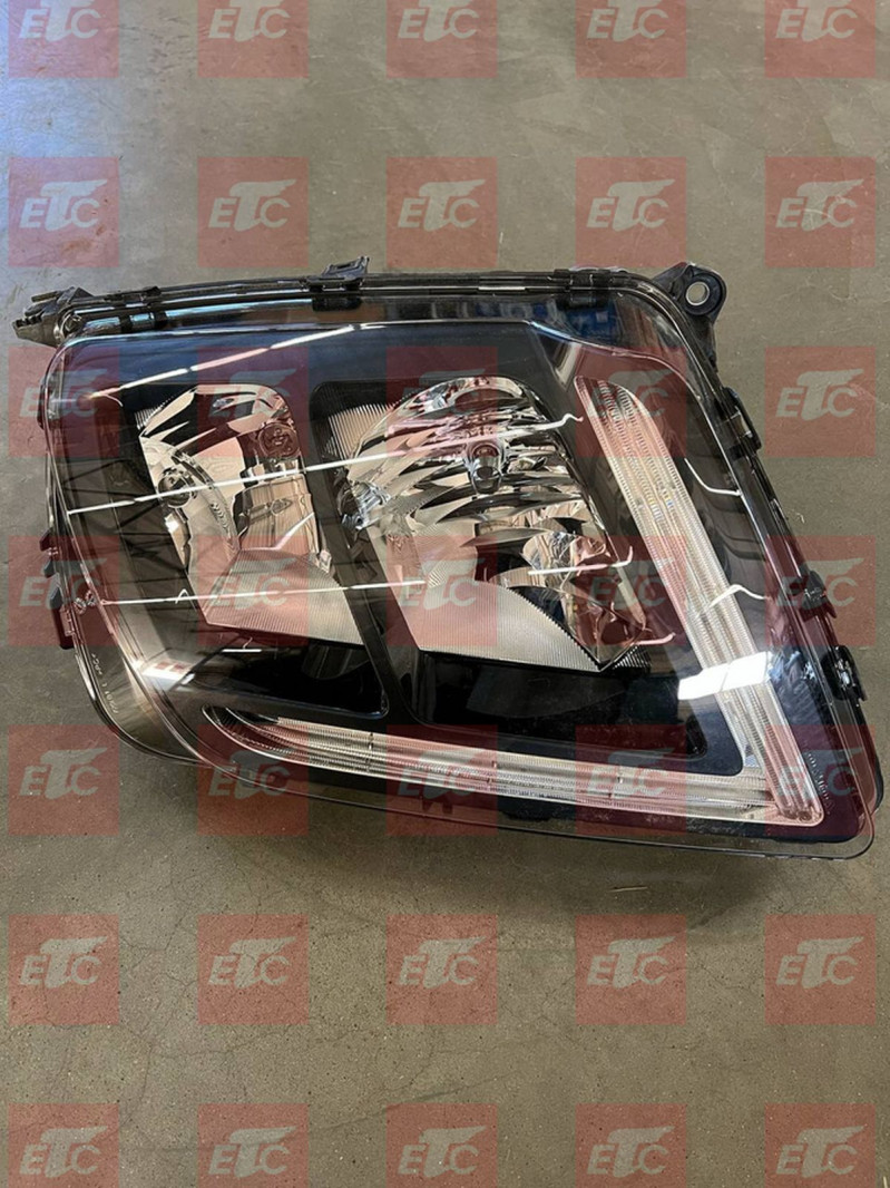 VO 24159415 Фара левая FMX — 2